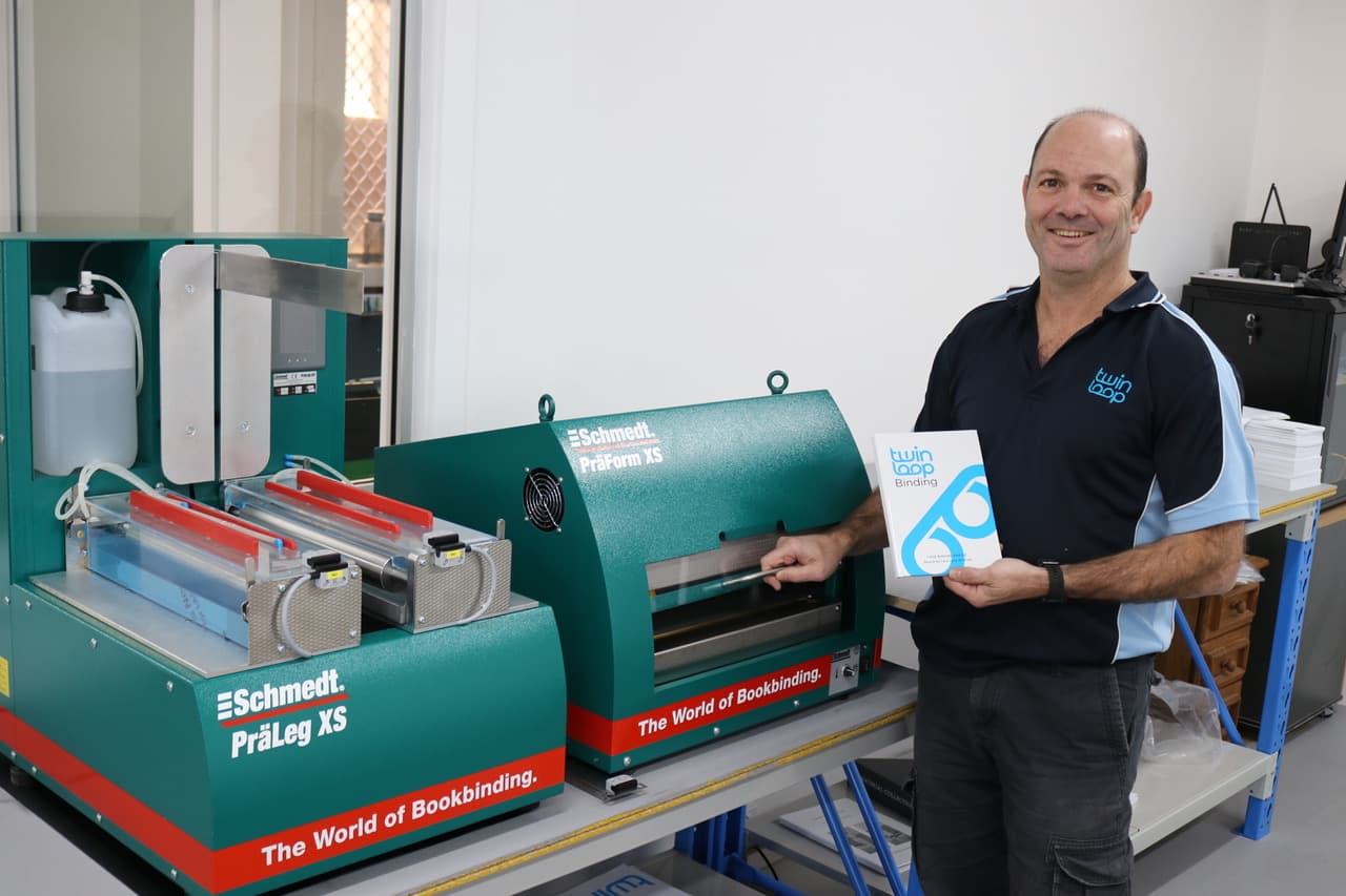 Wayne Rubin with Twin Loop's Schmedt case binding equipment